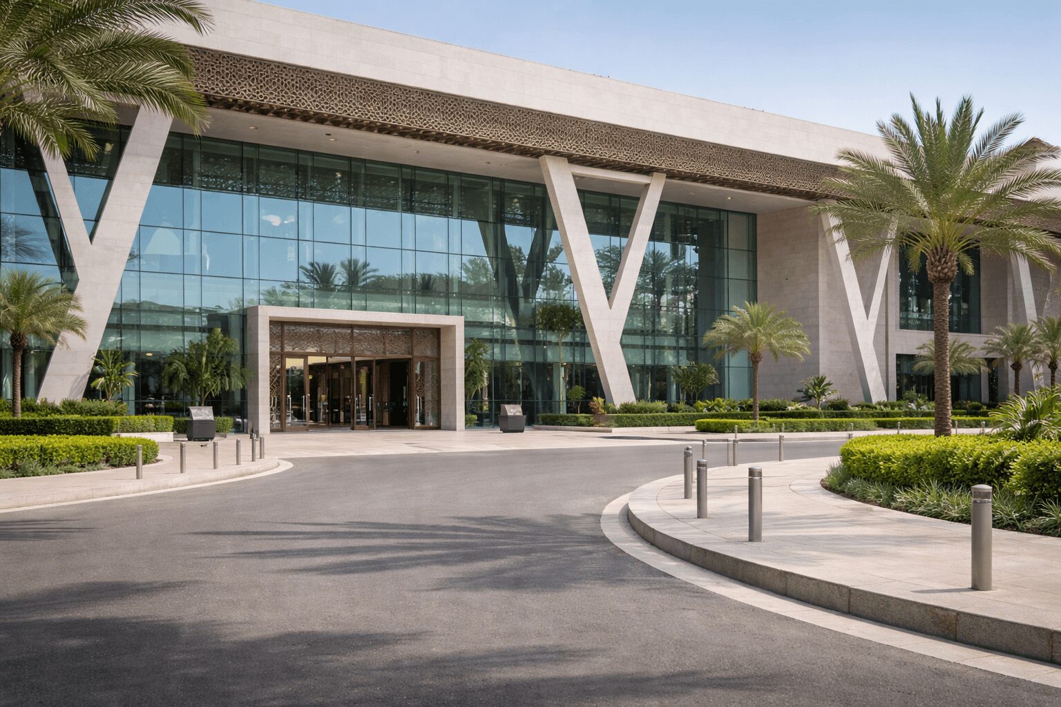 Modern conference center in Morocco with contemporary glass facade and organized driveway exterior